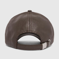 Brown faux leather Cat Heritage hat, showcasing the rear view with an adjustable strap and metal buckle.
