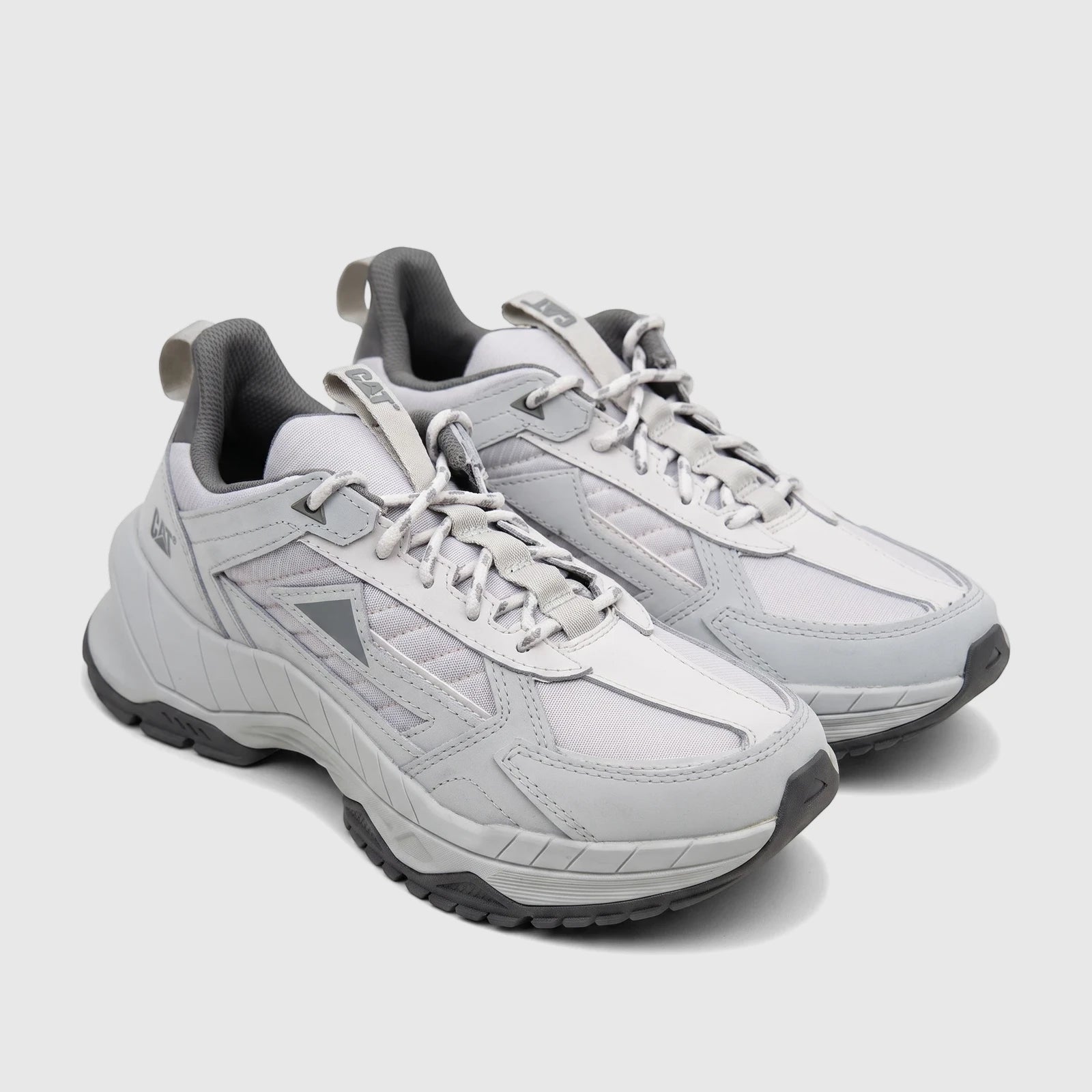 Pair of Cat Men's Amperage P726915 Glacier Grey athletic sneakers with mesh and synthetic upper.
