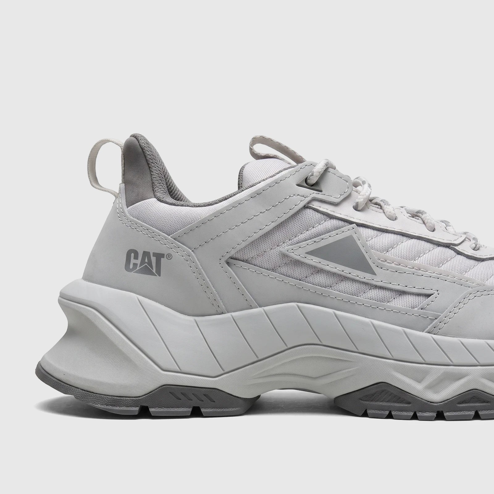 Close-up of a Cat Men's Amperage P726915 sneaker in glacier grey, featuring a chunky sole and mesh upper.