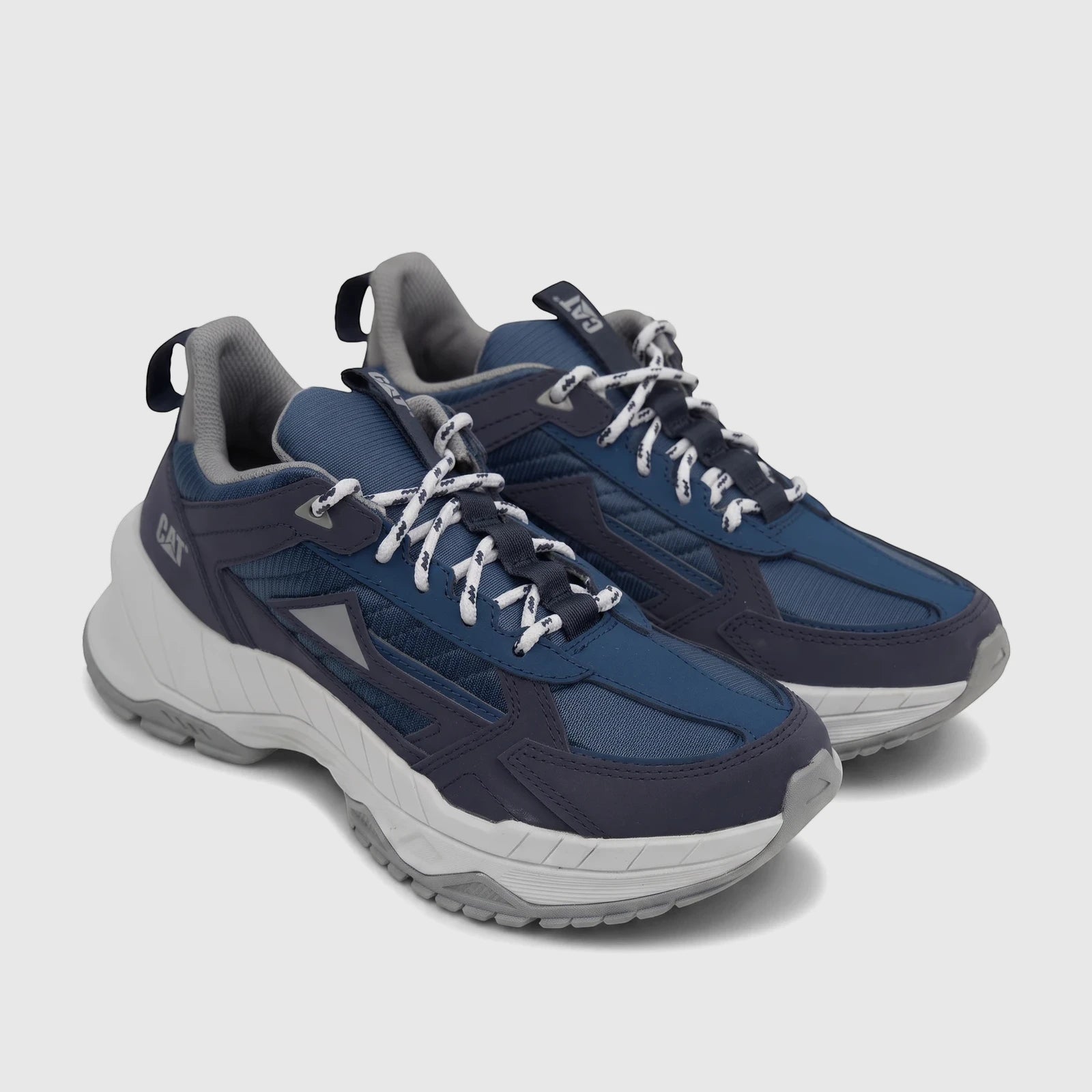 Cat Men's Amperage P726916 Blue Wing Teal CT392 sneakers in navy blue and gray, presented in a side view.