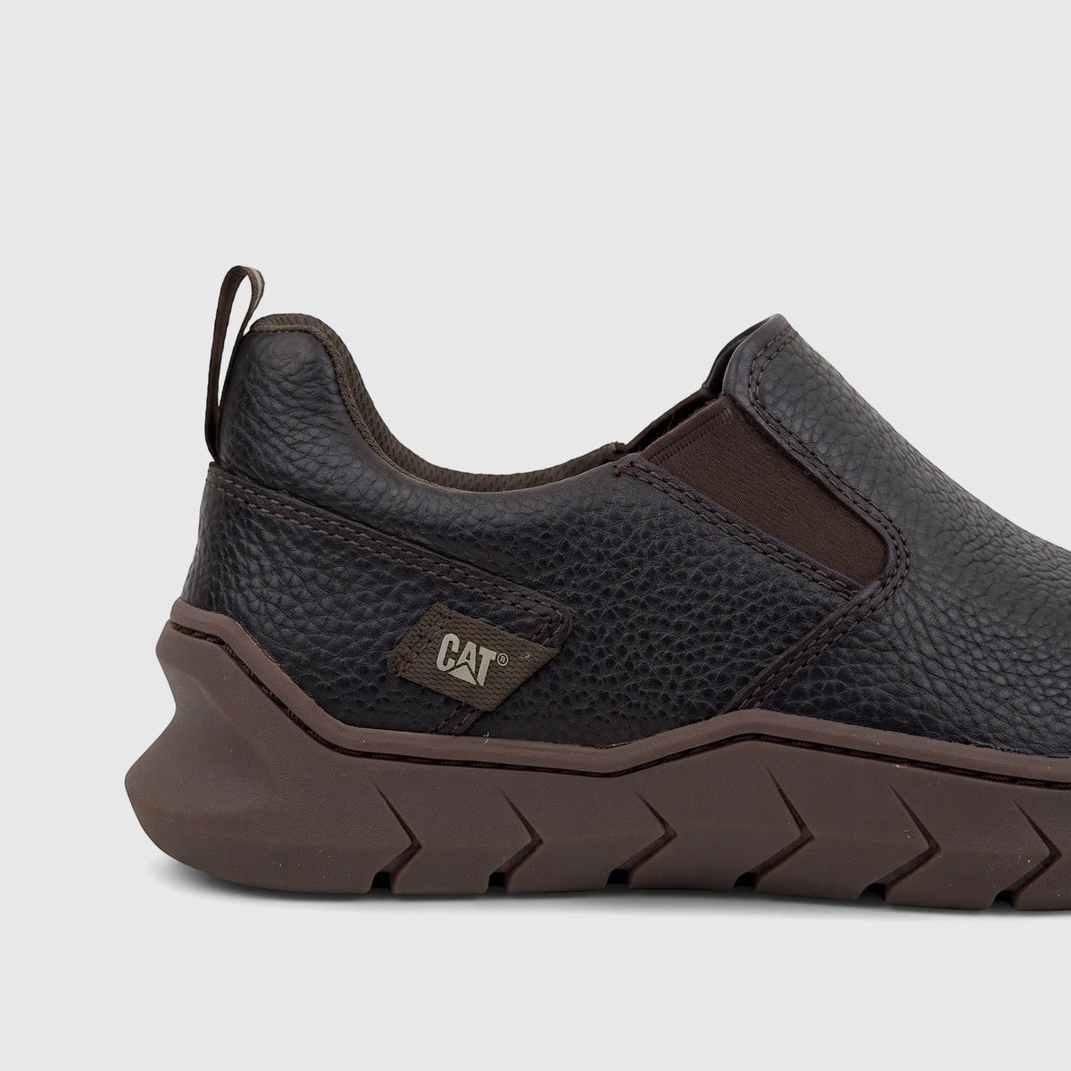 Cat Men's Flexion Slip On shoe in coffee bean, featuring a dark brown textured upper and a distinct brown sole, viewed from