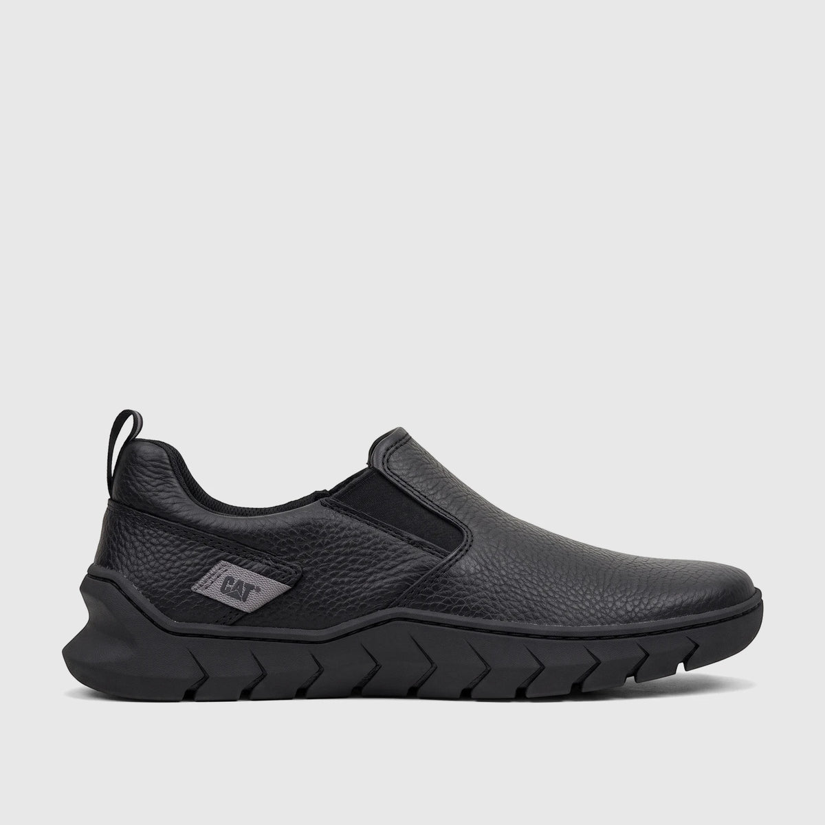 Black Cat Men's Flexion slip-on shoe, model P726867 CT415, shown from the side with a textured upper and distinctive sole.