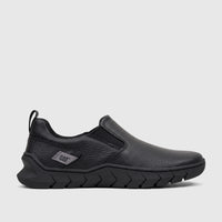 Black Cat Men's Flexion slip-on shoe, model P726867 CT415, shown from the side with a textured upper and distinctive sole.