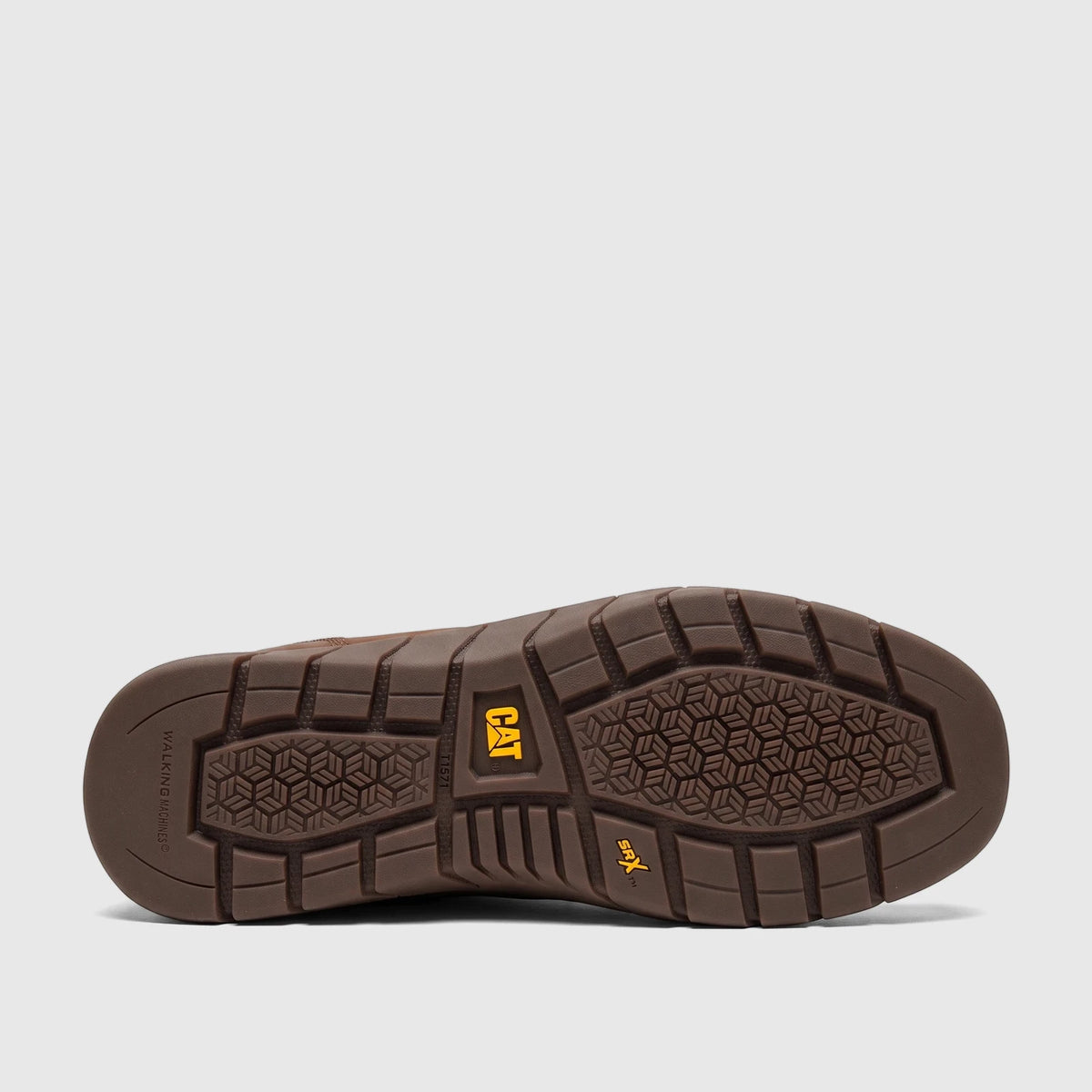 Close-up view of the brown rubber sole of a Cat Men's Flexion slip-on shoe, showcasing the durable tread pattern.