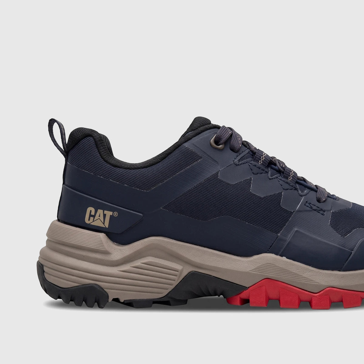 Cat Men's Grapple No Sew P726821 Total Eclipse CT425 shoe, navy blue with beige midsole and red accents from a side profile,