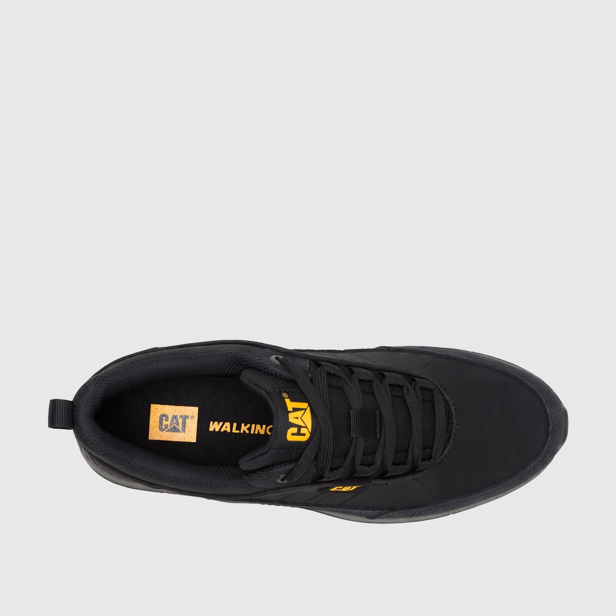 Top-down view of a single Cat Men's Press Sport Lo P727143 black sneaker, featuring yellow branding and black laces.