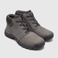 Pair of grey Cat Men's Threshold Chukka P726890 boots with black laces and rugged black soles, angled view.