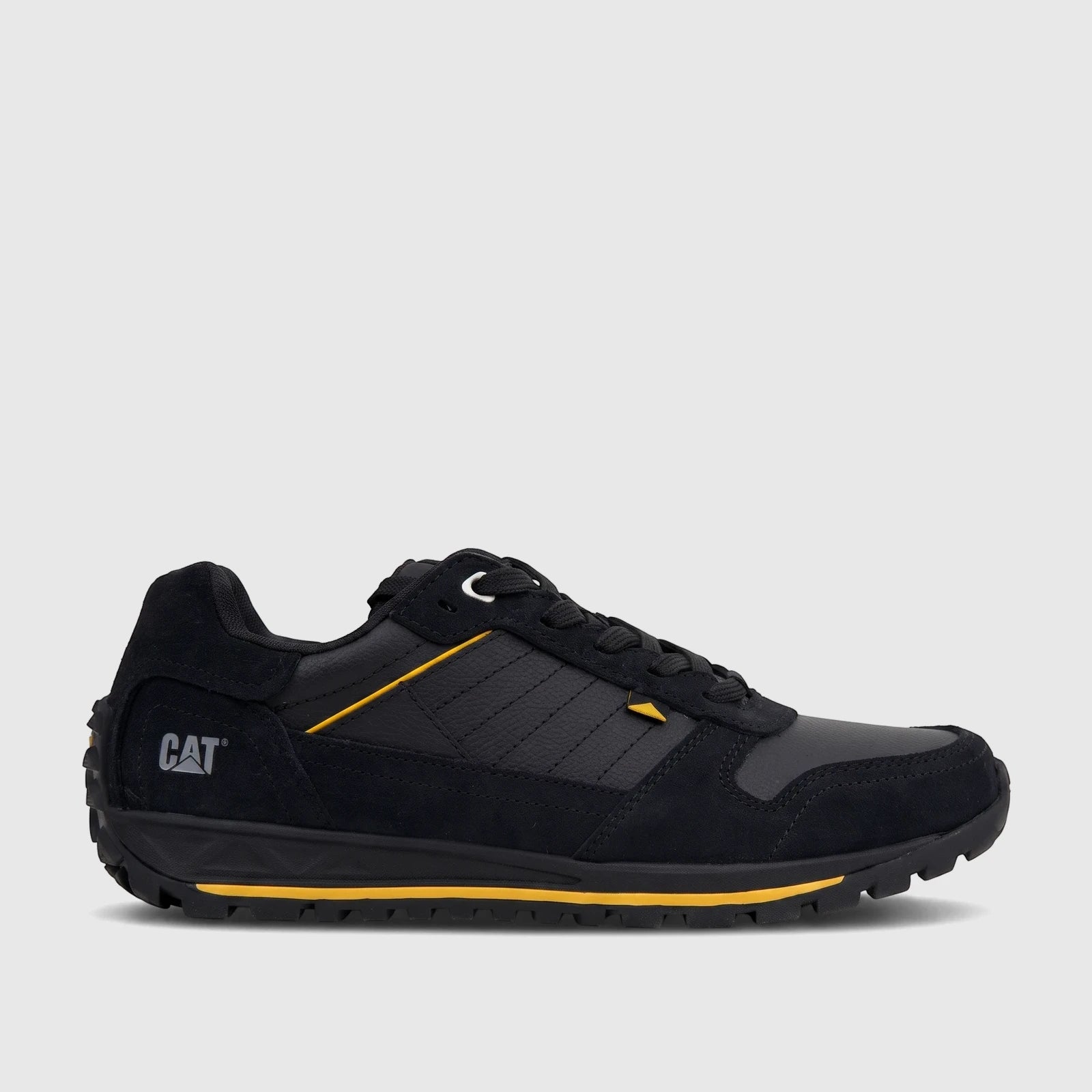Cat Men's Trigen P726923 CT401 black and yellow sneaker with textured panels and a lugged sole, side view.