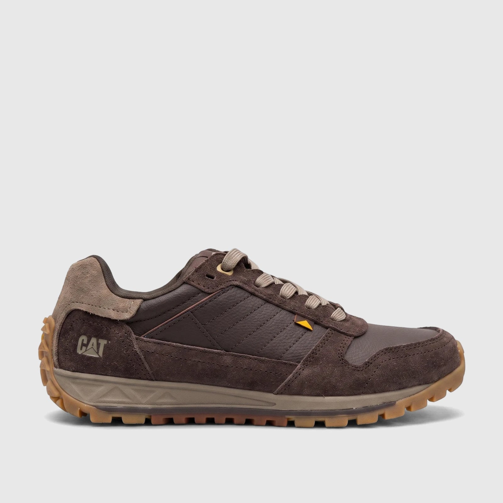 Cat Men's Trigen P726924 Coffee Bean CT402 shoe, a brown athletic-style sneaker with suede and leather details, shown in a