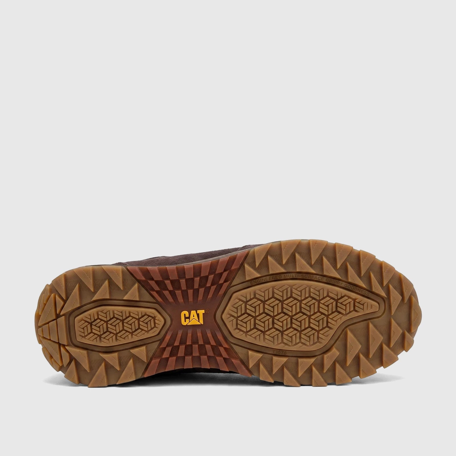 Brown Cat Men's Trigen P726924 shoe, featuring a detailed view of its robust sole with intricate tread patterns and the