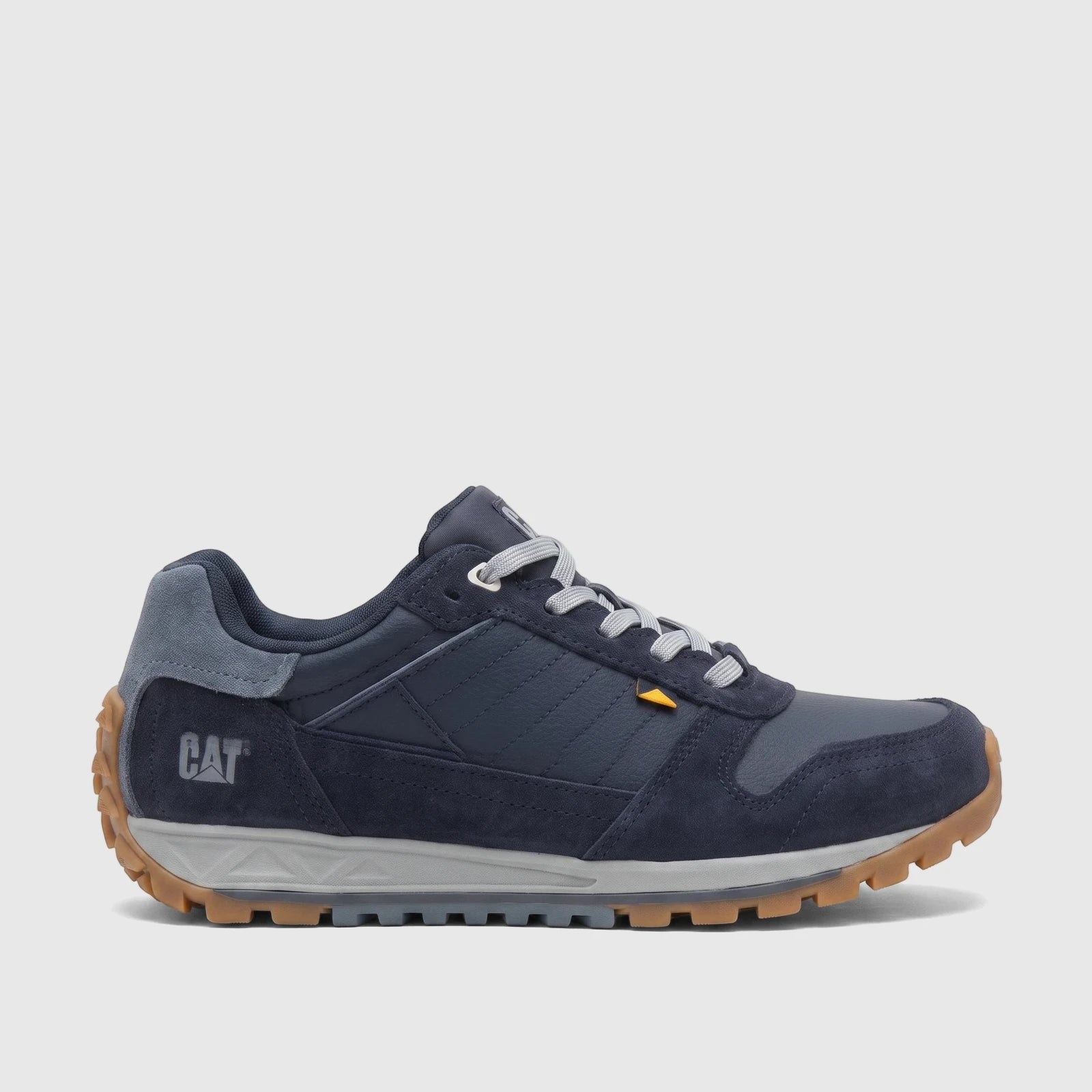 Dark blue and gray Cat Men's Trigen P726925 Total Eclipse CT403 sneaker, side view on a white background.