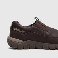 Dark brown Cat Men's Versage Slip On shoe, P727013 Coffee Bean CT421, in a close-up side profile view with the Caterpillar