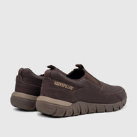 Men's brown leather Caterpillar Versage slip-on shoes, shown from a rear-quarter view with the logo visible.