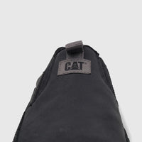 Close-up of a single black Cat Men's Versage slip-on shoe, featuring the grey brand logo on the tongue.