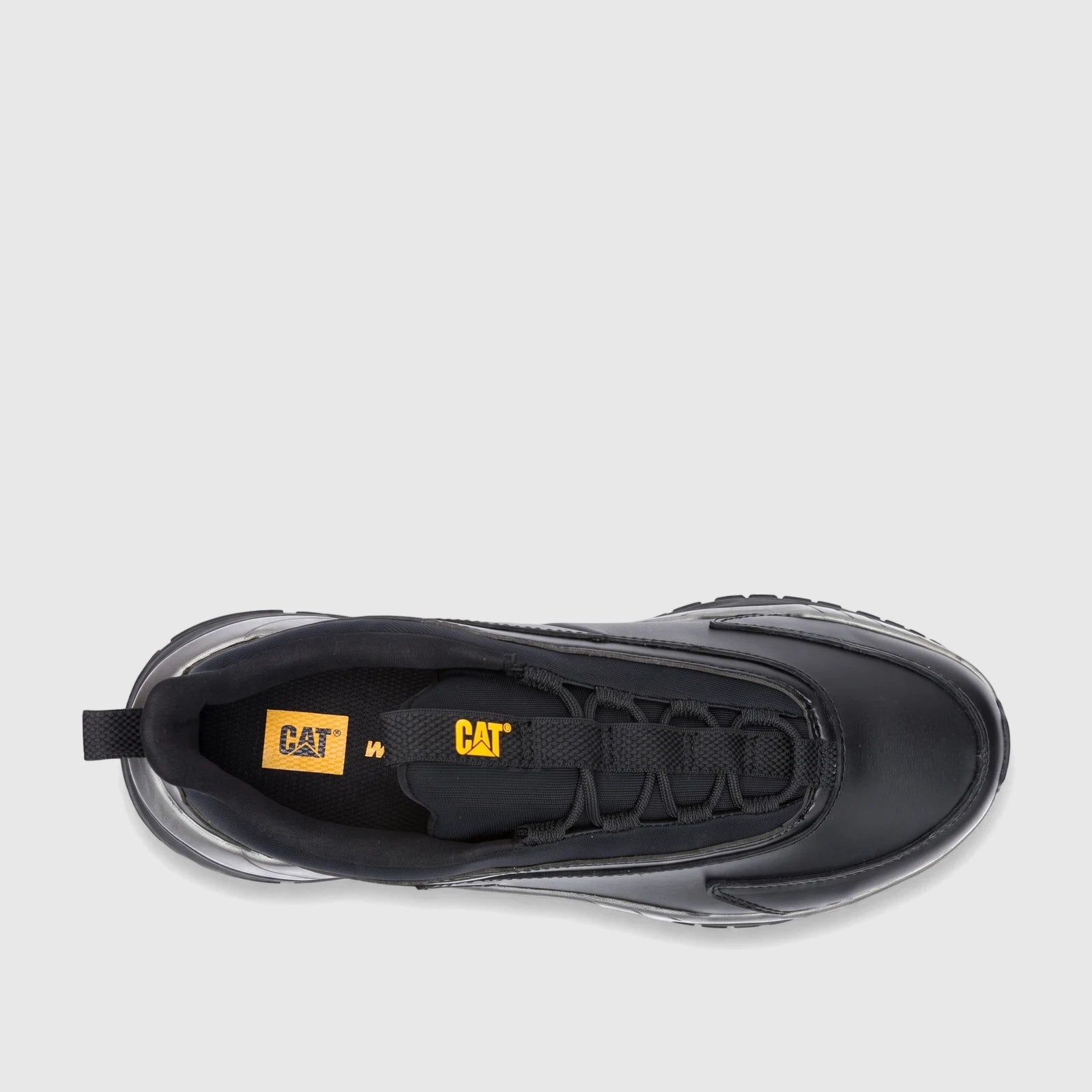 Top-down view of a black Cat Men's Voltage P726843 CT404 men's shoe with yellow brand logos and intricate lacing.