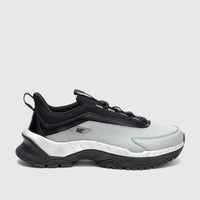 Cat Men's Voltage P726846 sneakers in limestone grey and black, featuring a chunky sole and side logo, viewed from the side.