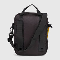 Black Cat Namib Tablet Bag, back view, made of durable fabric with an adjustable shoulder strap and carrying handle.