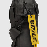 Close-up of a black textured Cat Namib Tablet Bag with zippers featuring the 'CAT' logo and a prominent yellow 'CATERPILLAR'