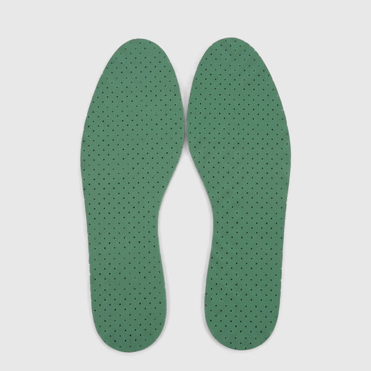 A pair of light green Chlorophyll Unisex Insoles with perforated surfaces, laid flat on a white background.