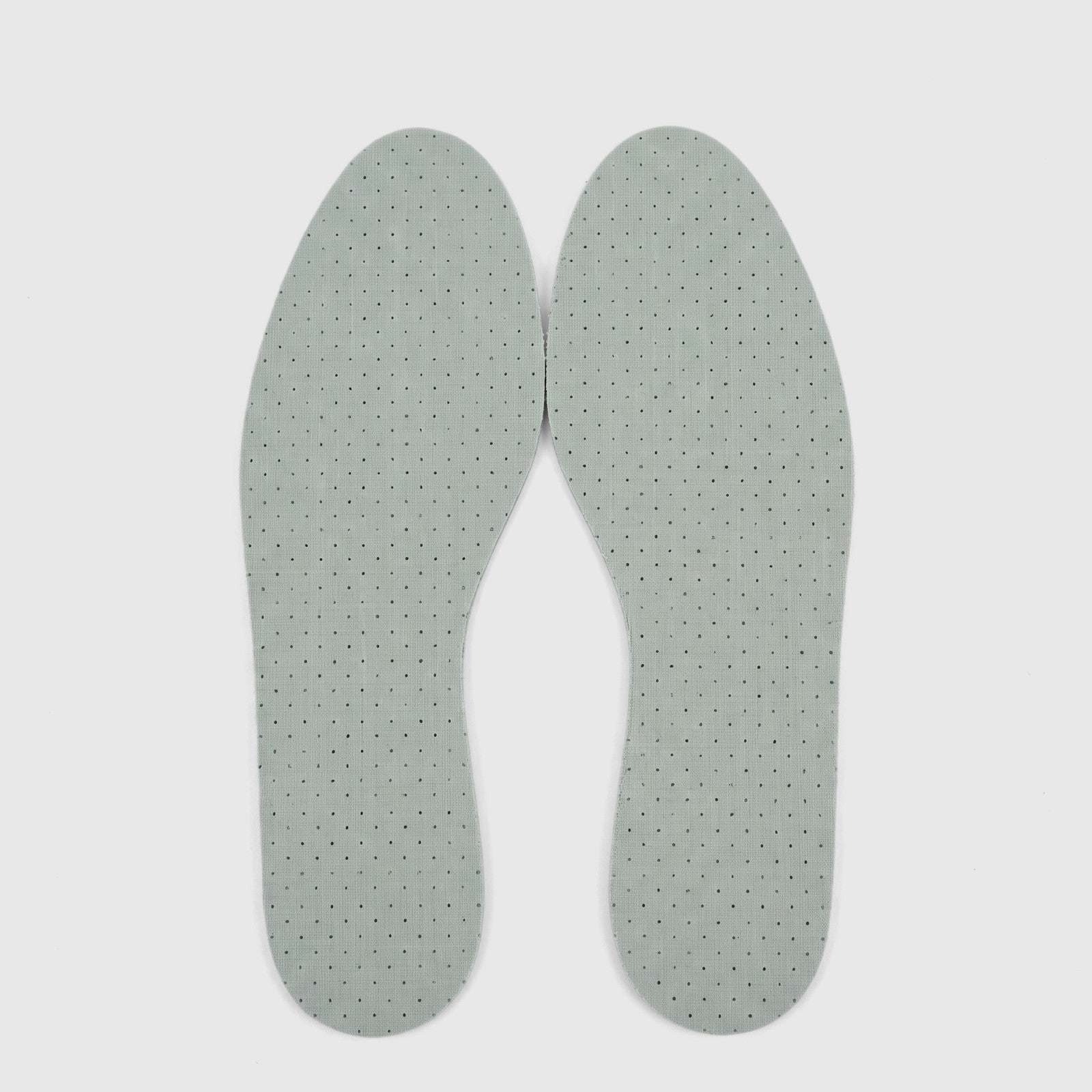 A pair of light green Chlorophyll Unisex Insoles with perforated surfaces, laid flat on a white background.
