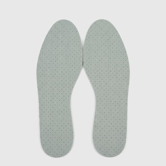 A pair of light green Chlorophyll Unisex Insoles with perforated surfaces, laid flat on a white background.