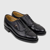 Crockett and Jones Men's Dress Lace Up Jason shoes in black leather, featuring a cap toe with brogue detailing and textured