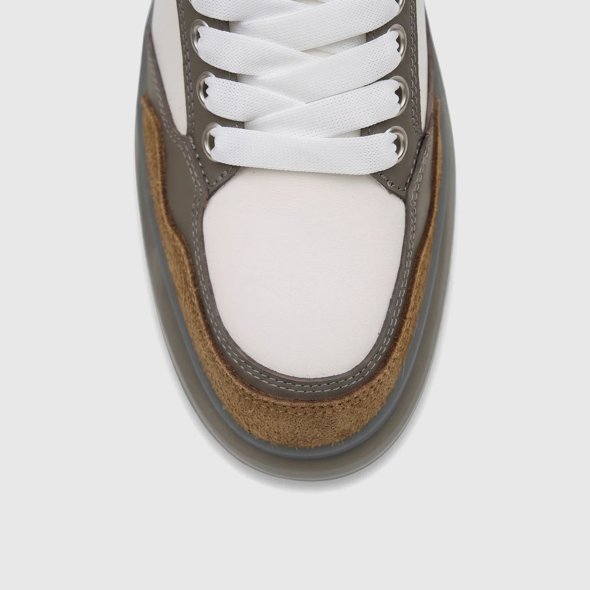 Close-up top-down view of a men's Crockett And Jones Tito sneaker, featuring white leather, coffee brown suede, and grey