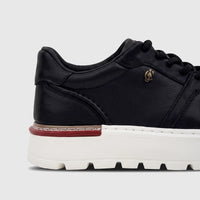 Side view of a Crockett and Jones Men's Sneaker Tino 62.CGS547A in black leather with a chunky white platform sole.