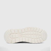Bottom view of a Crockett and Jones Men's Tino sneaker, featuring an off-white textured sole with a distinct tread pattern.