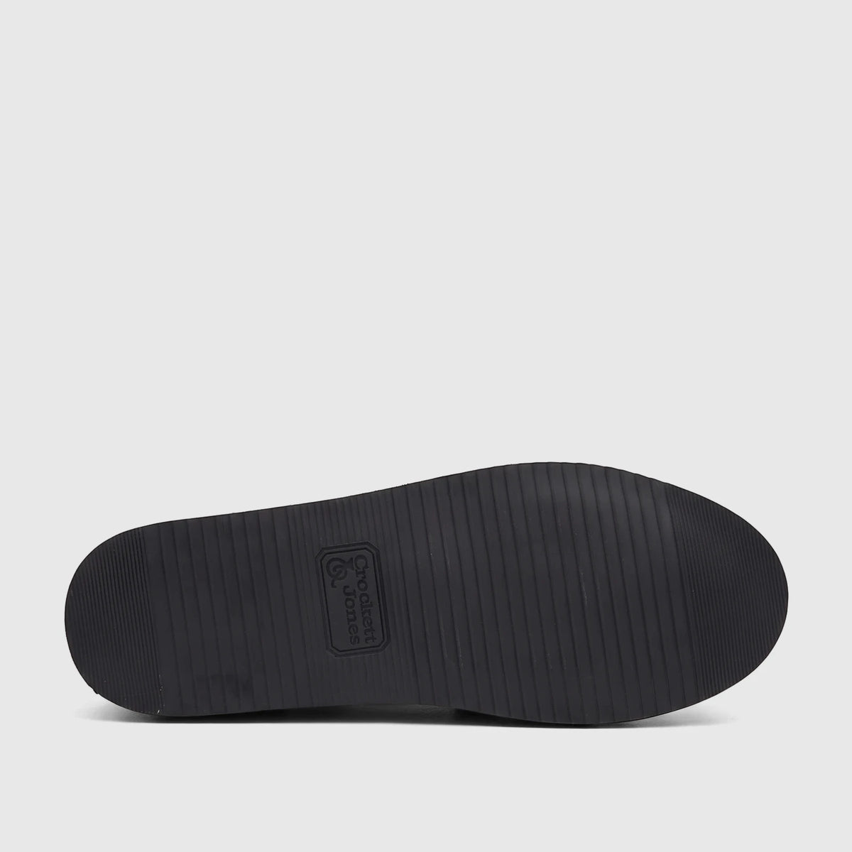 Underside view of a black Crockett and Jones Men's Alonzo lace-up brogue shoe with a rubber sole and brand logo.