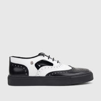 Crockett and Jones men's black and white lace-up brogue shoe with perforated details and a thick sole, side view.