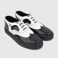 Crockett and Jones Men's Lace Up Brogue Alonzo shoes. Stylish black and white leather wingtips with thick soles.
