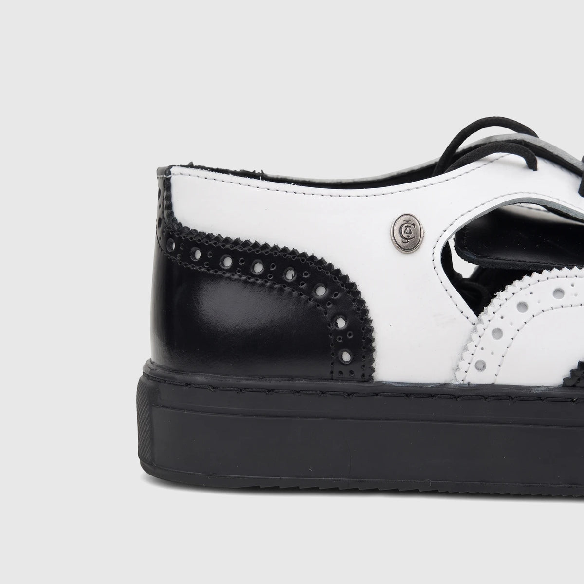 Crockett and Jones Men's Lace Up Brogue Alonzo shoe in black and white leather, with detailed perforations and a platform