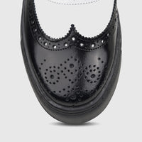 Close-up, top-down view of a Crockett and Jones Men's Lace Up Brogue Alonzo shoe in black and white leather with perforated