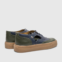Crockett and Jones Men's Lace Up Brogue Alonzo shoes in navy and olive green leather with thick tan soles, side view.