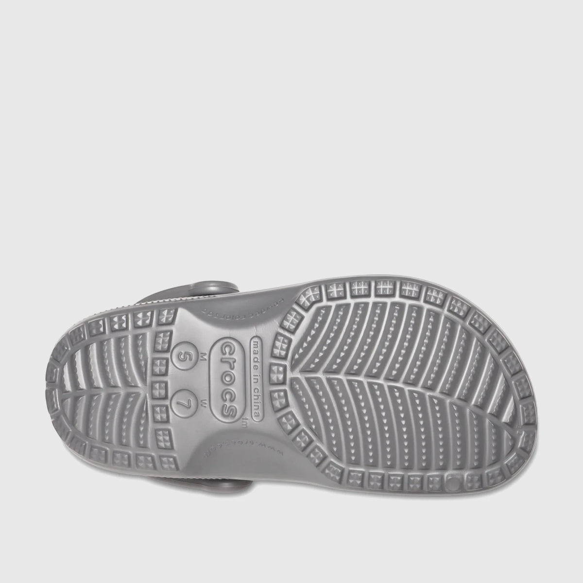 Crocs Classic 10001-0DA in slate grey, close-up of the molded outsole showing tread pattern and grip.