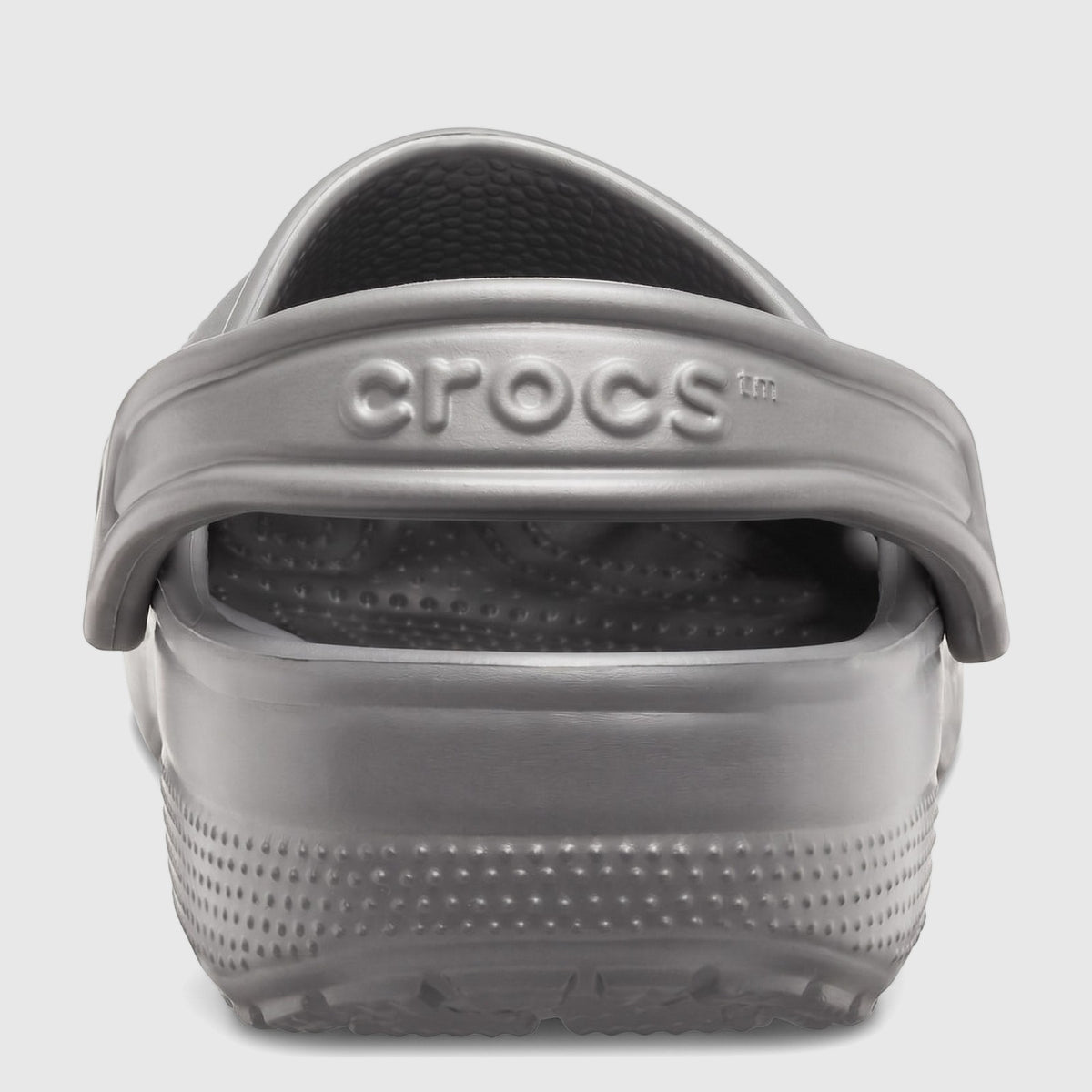 Rear view of a Crocs Classic 10001-0DA clog in slate grey, showcasing the iconic design and textured sole.