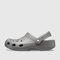 Crocs Classic clog shoe in slate grey, shown from the side, featuring ventilation ports and a movable heel strap.