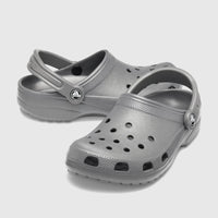 Pair of Crocs Classic clogs in slate grey, showcasing the iconic lightweight, slip-on design with ventilation ports and a