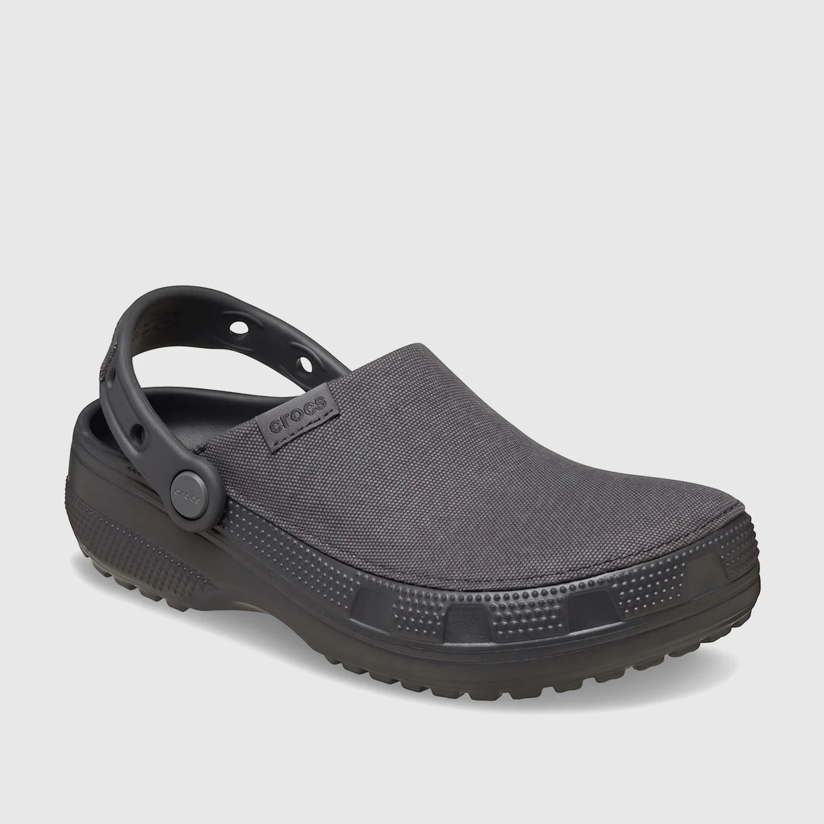 Black Crocs Classic Crafted Clog with a textile upper and synthetic sole, viewed from the side on a white background.