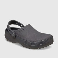 Black Crocs Classic Crafted Clog with a textile upper and synthetic sole, viewed from the side on a white background.
