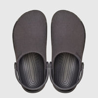 Pair of dark grey Crocs Classic Crafted Clogs with canvas uppers, shown from a top-down perspective.