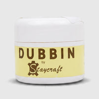 A white jar of Dubbin By Staycraft 125ML leather conditioning cream with a yellow label, presented on a clean background.