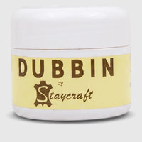 White plastic jar of Dubbin By Staycraft 125ML leather conditioning treatment, photographed from the front.