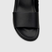 Close-up front view of a black Fabino Men's Leather Comfort Sandal, showcasing the wide strap and comfortable footbed.
