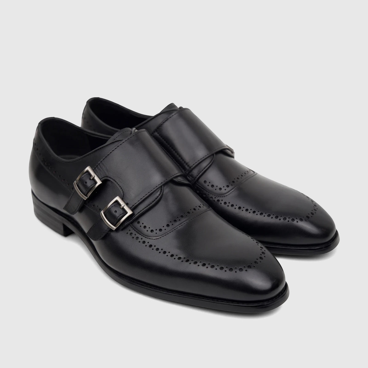 Fabino Men's black leather double monk strap dress shoes with brogue details, shown at a slight angle.