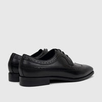 Black Fabino Men's Dress Leather Lace Up Brogue shoes, featuring detailed perforations and a classic design, shown from a