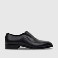 A men's black leather slip-on dress shoe, side view, featuring elegant brogue detailing and a polished finish.