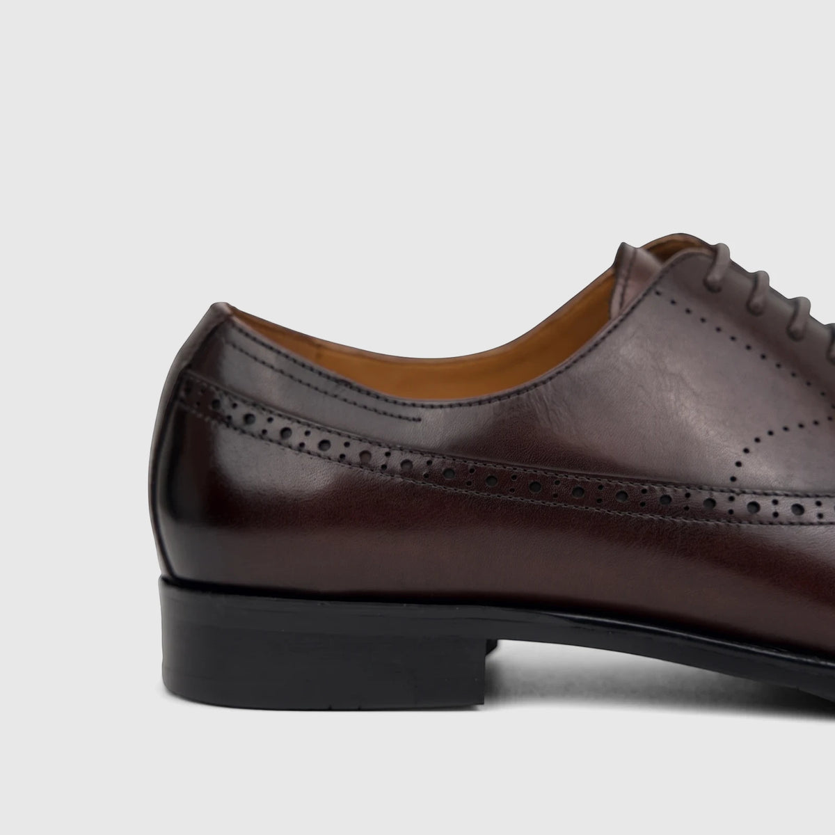 Brown leather Fabino men's M3220206 Coffee FB32 dress lace-up oxford shoe with brogue detailing, side view.
