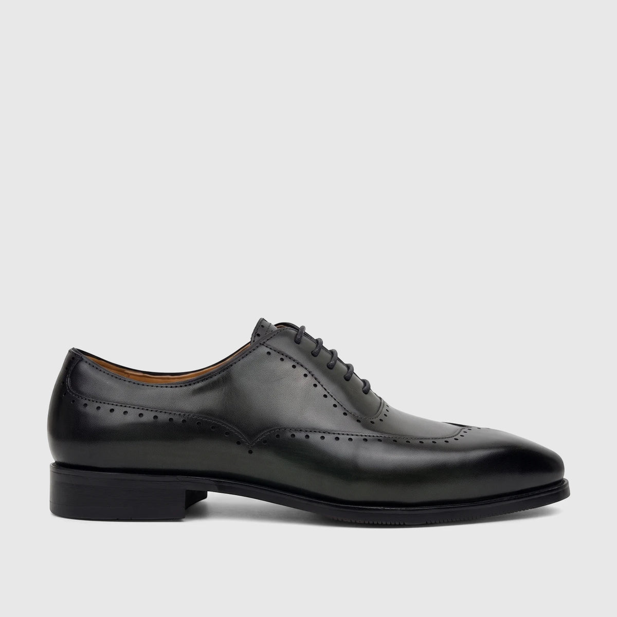 Fabino Men's green leather lace-up brogue dress shoe, presented in a side profile view on a white background.
